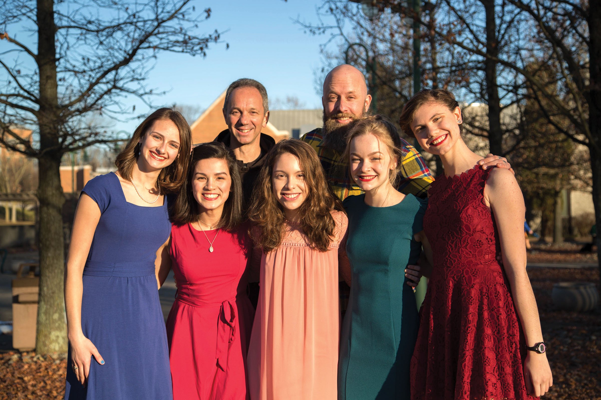 Group of Smiling Women and Two Men